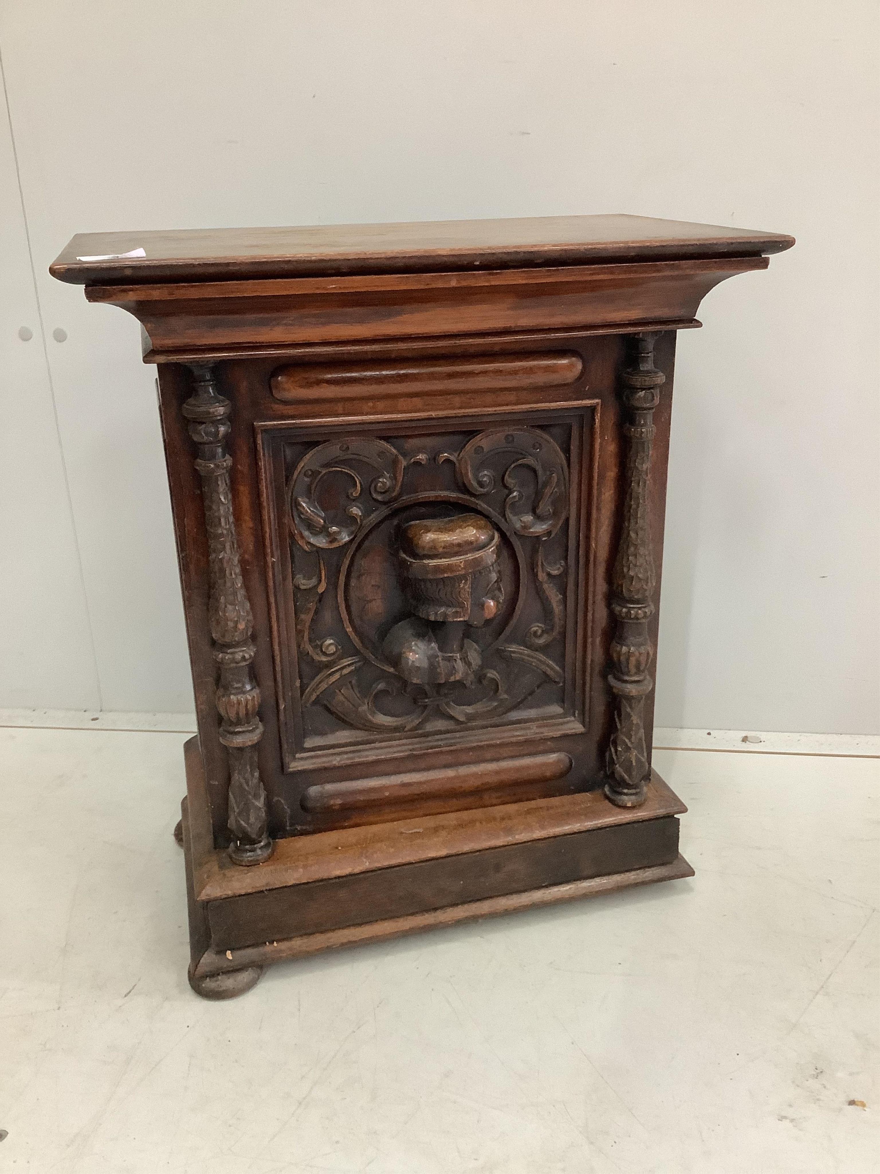 A small Italian carved oak and walnut collector's chest, fitted ten bird's eye maple faced drawers, width 49cm, depth 29cm, height 58cm. Condition - fair